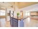 Open concept kitchen with island and stainless steel appliances at 7216 W Irma Ln, Glendale, AZ 85308