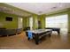 Game room with air hockey and pool table at 2868 N Coronado Dr, Florence, AZ 85132