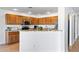 Well-equipped kitchen with granite counters and wood cabinets at 31777 N Sundown Dr, San Tan Valley, AZ 85143