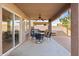 Covered patio with table and chairs, perfect for outdoor dining at 31777 N Sundown Dr, San Tan Valley, AZ 85143