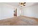 Main bedroom with ensuite bathroom access and ceiling fan at 31777 N Sundown Dr, San Tan Valley, AZ 85143