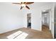Bedroom with a walk-in closet and access to hallway at 31777 N Sundown Dr, San Tan Valley, AZ 85143