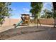 Backyard with playset, providing fun for children at 31777 N Sundown Dr, San Tan Valley, AZ 85143
