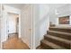 Stairwell leading upstairs with neutral carpet at 31777 N Sundown Dr, San Tan Valley, AZ 85143