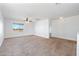 Large bedroom with ceiling fan and neutral carpeting at 31777 N Sundown Dr, San Tan Valley, AZ 85143