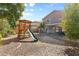 Large backyard with playset and plenty of space at 31777 N Sundown Dr, San Tan Valley, AZ 85143
