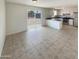 Kitchen and dining area combo with tile floor and sliding glass door at 4847 W Granada Rd, Phoenix, AZ 85035