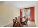Formal dining room with wood table and chairs at 42609 W Milky Way, Maricopa, AZ 85138