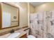 Bathroom with single vanity and shower/tub combo at 42609 W Milky Way, Maricopa, AZ 85138
