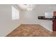 Bright dining area with tile floors and a chandelier at 11308 W Hazelwood St, Phoenix, AZ 85037