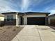 Image 1 of 56: 18435 W Desert Hollow Dr, Surprise