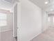 Clean hallway with light walls and carpet flooring at 853 E Agua Fria Ln, Avondale, AZ 85323