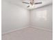 Bright bedroom with ceiling fan and carpet at 853 E Agua Fria Ln, Avondale, AZ 85323