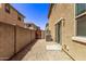 Small backyard with gravel and a block wall at 853 E Agua Fria Ln, Avondale, AZ 85323