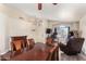 Bright dining room with a view of the living room and entryway at 1497 S Dove St, Gilbert, AZ 85233