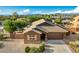 Single-story home with a private pool and mountain views in the background at 5222 E Cordia Ln, Cave Creek, AZ 85331