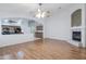 Living room with hardwood floors, high ceilings and a fireplace at 9464 E Olla Ave, Mesa, AZ 85212