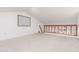 Large loft bedroom with carpeted floor and built-in shelving at 4901 E Kelton Ln # 1039, Scottsdale, AZ 85254