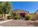 House exterior showcasing landscaping and walkway to the front door at 21763 N Verde Ridge Dr, Sun City West, AZ 85375