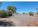 Spacious backyard with gravel and block wall fencing at 2316 E Betty Elyse Ln, Phoenix, AZ 85022