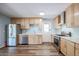 Updated kitchen, stainless steel appliances and wood cabinets at 2316 E Betty Elyse Ln, Phoenix, AZ 85022