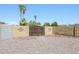 Large backyard with gated entry and gravel landscaping at 2316 E Betty Elyse Ln, Phoenix, AZ 85022