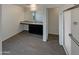 Bathroom with dark vanity, shower, and grey tile flooring at 2178 N 212Th Ln, Buckeye, AZ 85396