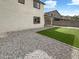 Landscaped backyard with gravel and artificial turf at 2178 N 212Th Ln, Buckeye, AZ 85396