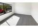 Bright bedroom with large window and grey carpet at 2178 N 212Th Ln, Buckeye, AZ 85396