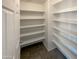 Walk-in pantry with ample shelving at 2178 N 212Th Ln, Buckeye, AZ 85396