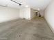 Attached garage with concrete floor and storage at 2178 N 212Th Ln, Buckeye, AZ 85396