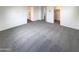 Large bedroom with carpet flooring, access to bathroom and closet at 2178 N 212Th Ln, Buckeye, AZ 85396