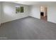 Spacious bedroom with carpet flooring and a view at 2178 N 212Th Ln, Buckeye, AZ 85396