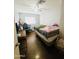 Bedroom with a bed, desk, and gaming chair at 5919 W Marlette Ave, Glendale, AZ 85301