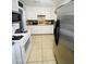 White cabinets and stainless steel appliances at 5919 W Marlette Ave, Glendale, AZ 85301