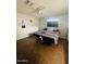 Spacious bedroom with a large bed and ceiling fan at 5919 W Marlette Ave, Glendale, AZ 85301