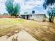 Backyard view of house, shed, and patio at 5919 W Marlette Ave, Glendale, AZ 85301