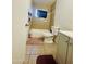 Clean bathroom with tub and pedestal sink at 5919 W Marlette Ave, Glendale, AZ 85301