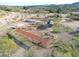 Aerial view of property with horse stables and multiple RVs at 51445 N 299Th Ave, Wickenburg, AZ 85390