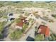 Aerial view of property with house and multiple stables at 51445 N 299Th Ave, Wickenburg, AZ 85390