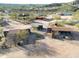 Aerial view of property showing multiple buildings and surrounding landscape at 51445 N 299Th Ave, Wickenburg, AZ 85390