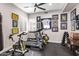 Home gym with a treadmill, stationary bike, and weights at 8856 E Via De Luna Dr, Scottsdale, AZ 85255