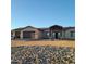 House with two-car garage and rock landscaping at 48515 N 13Th Ave, New River, AZ 85087