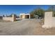 View of the home's exterior, with a gravel driveway at 50644 N 33Rd Ave, New River, AZ 85087