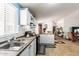 White kitchen with stainless steel appliances at 9431 E Coralbell Ave # 172, Mesa, AZ 85208