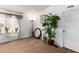 Bright spare bedroom with large plant and mirror at 9431 E Coralbell Ave # 172, Mesa, AZ 85208