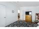 Bedroom with a double bed and wood dresser at 9431 E Coralbell Ave # 172, Mesa, AZ 85208