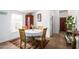 Small dining area with a round table and four chairs at 9431 E Coralbell Ave # 172, Mesa, AZ 85208
