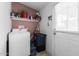 Laundry room with washer, storage, and exterior access at 9431 E Coralbell Ave # 172, Mesa, AZ 85208