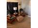 Relaxing living area with rocking chairs and ottoman at 2701 E Allred Ave # 68, Mesa, AZ 85204